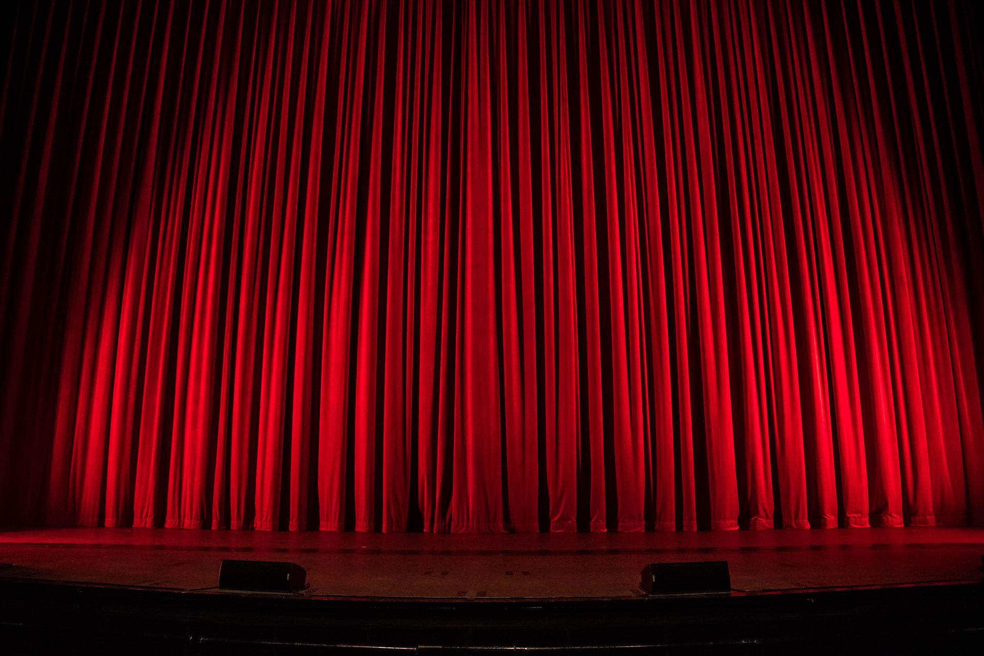 furniture in front of a curtain