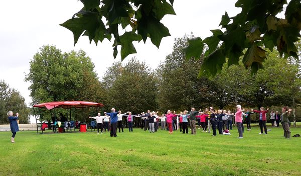 a group of people in a park