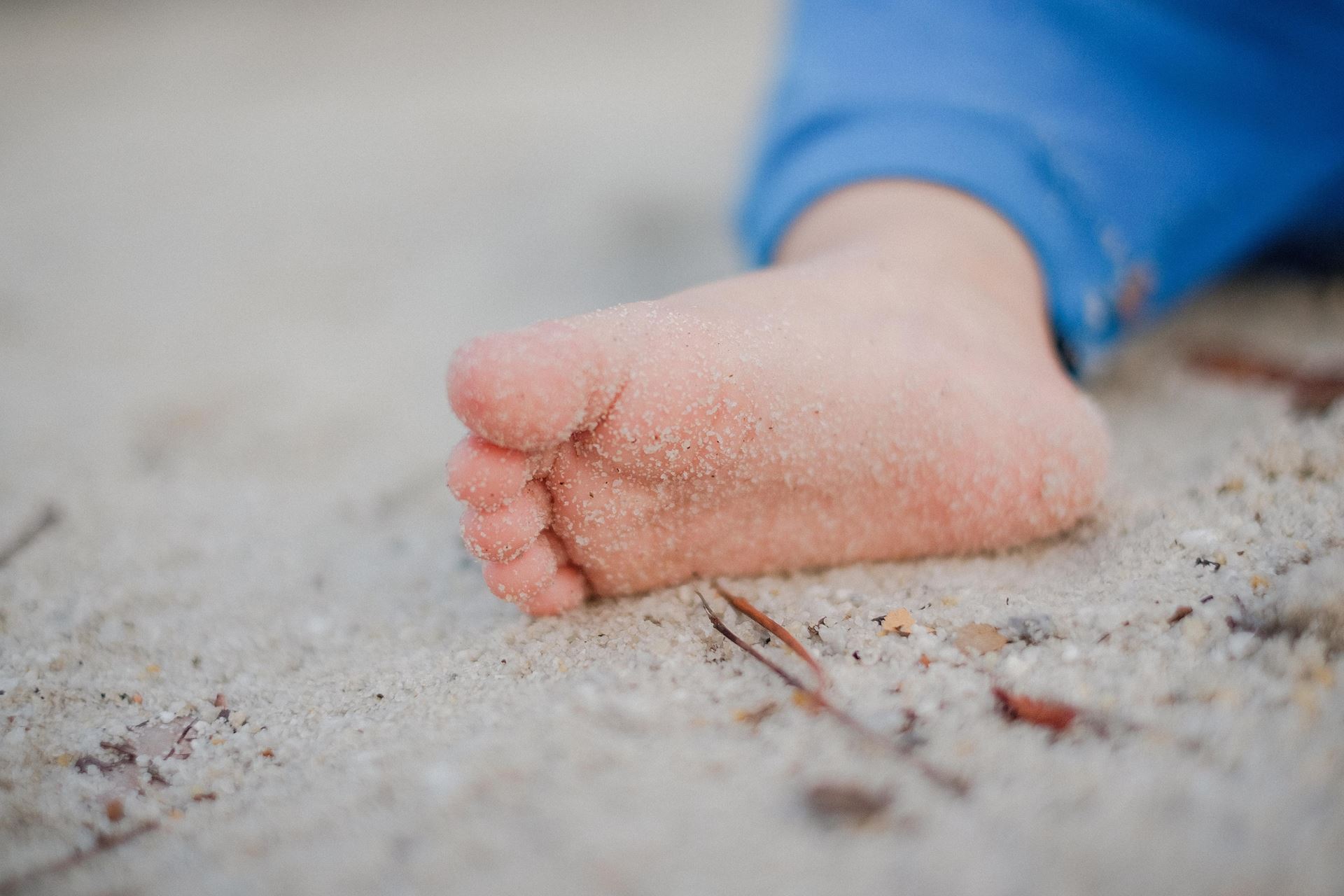 a close up of a person lying on the ground